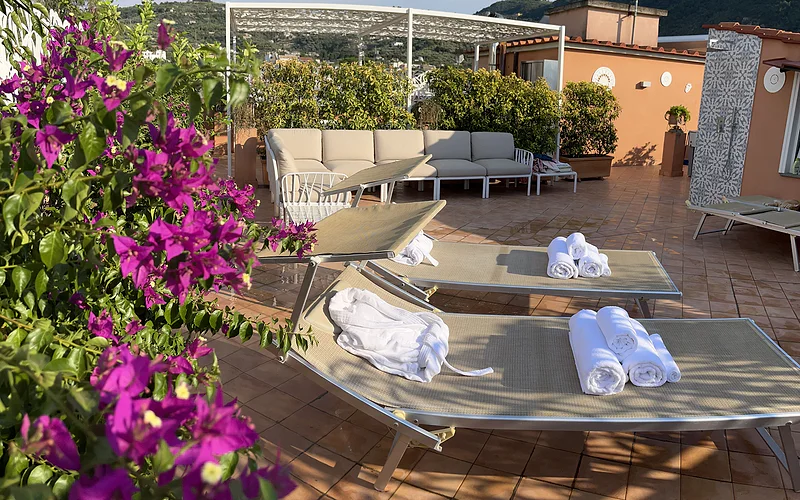 Two Double rooms with private bathrooms and an equipped roof terrace.